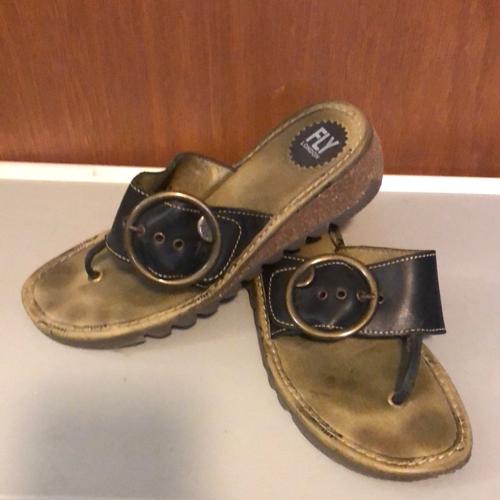 Fly London black with circle buckle size 10 sandals